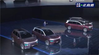Huawei Qiankun ADS 5 launch stage with Dongfeng Yijing X9 dark-red flagship SUV in CCTV live broadcast reveal