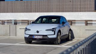 MG4 electric hatchback in Danish EV showroom representing MG's 4200 unit H1 2026 volume and Chinese-linked brand penetration in Denmark