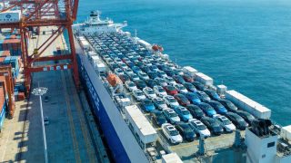 Chinese electric vehicles being loaded onto car carrier ship for export 2026
